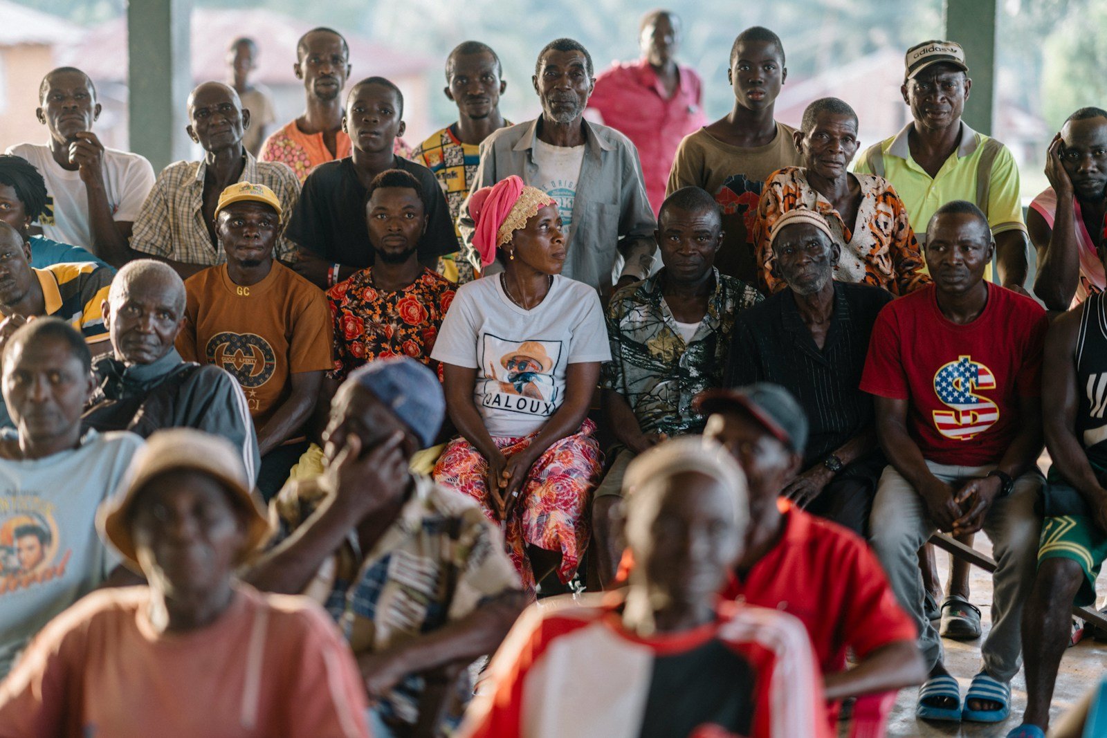Home A diverse group of people sitting together